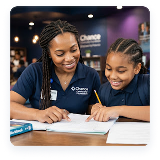 Mentor helping a young student with schoolwork